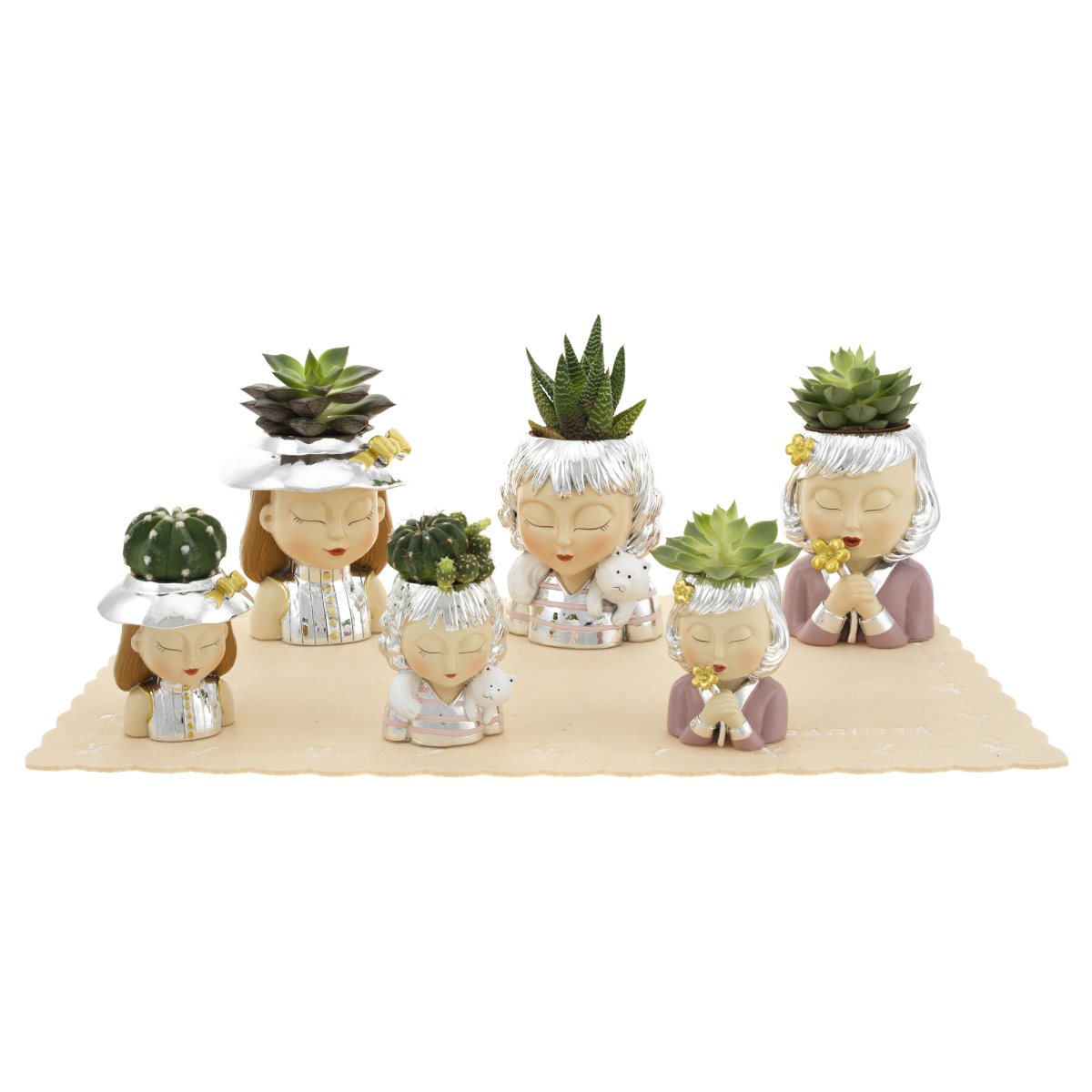 Expokit composto da 6 portavasi a forma di testa di donna in resina argentata con pianta succulenta