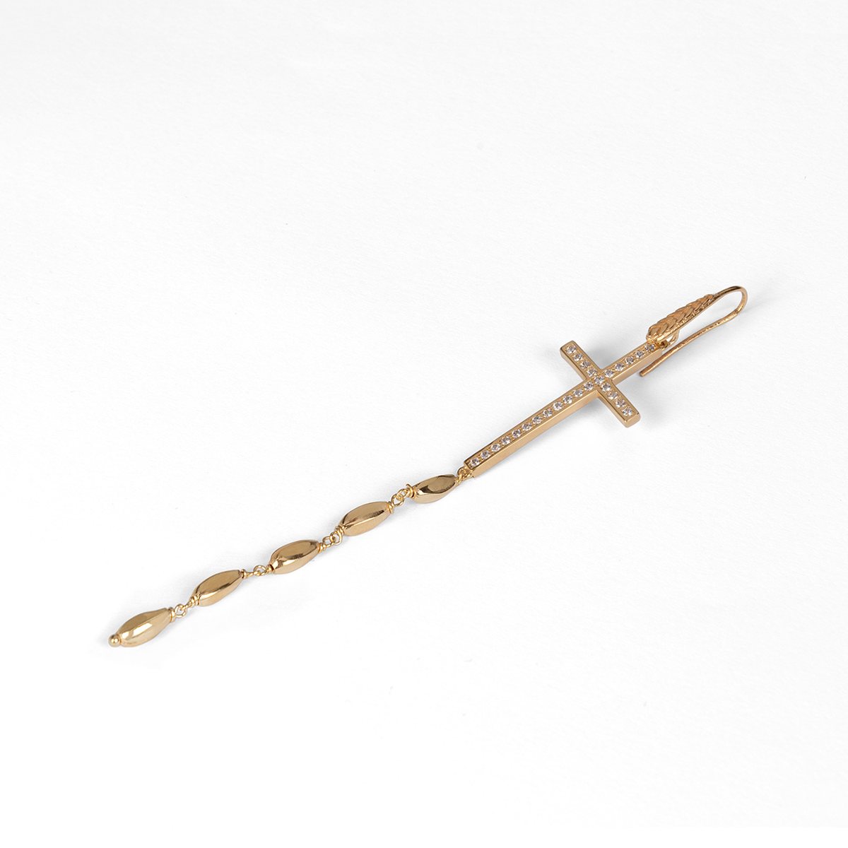 Orecchino chicco spirituale dorato realizzato in argento 925 dorato
zirconi dal brand dueaerre 1938